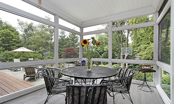 porch table with surrounding glass screen