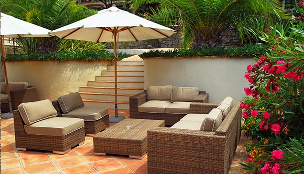 backyard canopy with wicker furniture