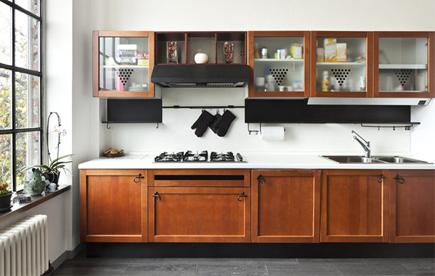 modern kitchen with wood and glass cabinets