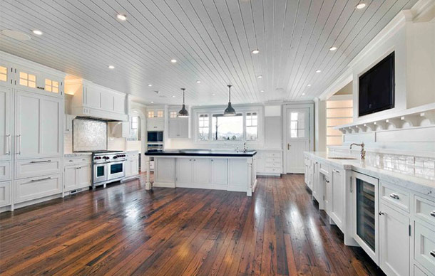 Contemporary kitchen with reclaimed hardwood floors